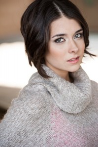 Allison Paige plays Gigi Darcy